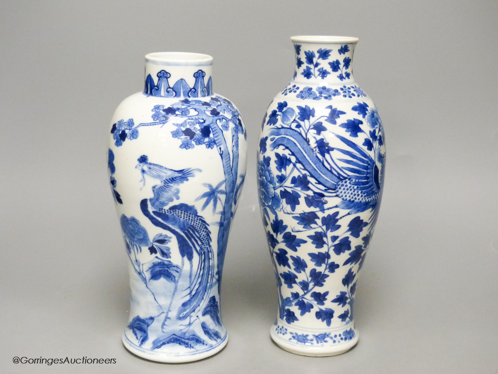Two 19th century Chinese blue and white vases, decorated with phoenix, tallest 28cm (a.f)